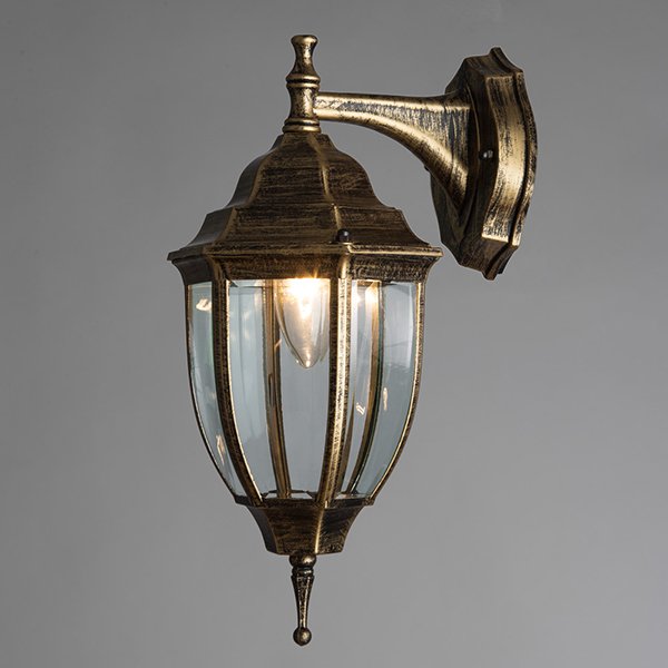 Настенный фонарь уличный Arte Lamp Pegasus A3152AL-1BN, арматура золото / черная, плафон стекло прозрачное, 16х18 см